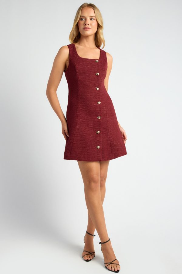 KoKo Estelle wine tweed mini dress with a sleeveless square neckline, gold-tone front buttons and a gently flared skirt, shown on a model