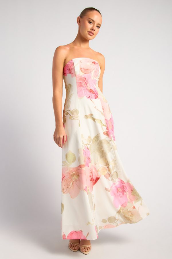 KoKo Petal Romance cream strapless maxi dress with oversized pink flowers, muted green foliage and a flowing A-line skirt, shown on a model